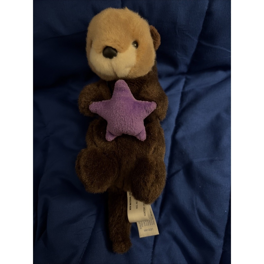 Aurora Sea Otter Brown Holding Purple Starfish Plush Stuffed Animal Toy Plush 9"